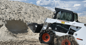 benefits of renting vs buying skid steer